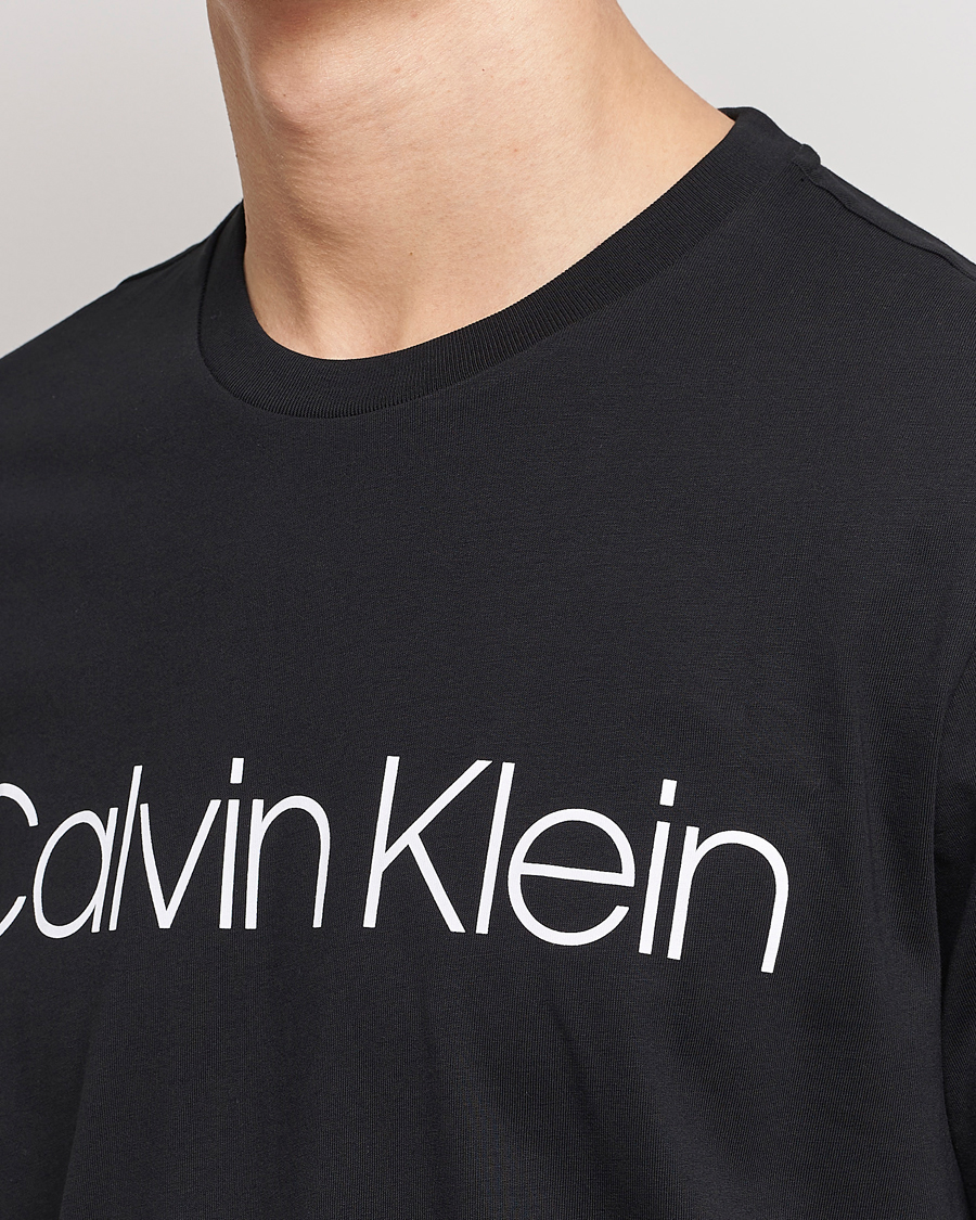 Tee Logo Care bei Klein Calvin Front Black of Carl