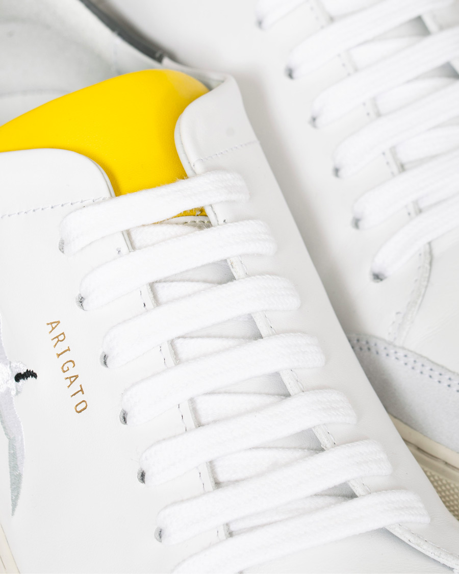 Herren | Axel Arigato Clean 90 Triple Bird Sneaker White/Yellow/Grey | Axel Arigato | Clean 90 Triple Bird Sneaker White/Yellow/Grey