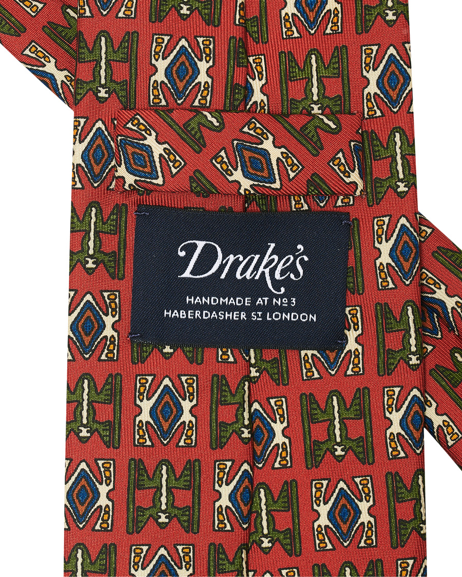 Herren | Drake's Silk Printed Native Pattern 8 cm Tie Dusty Red | Drake's | Silk Printed Native Pattern 8 cm Tie Dusty Red