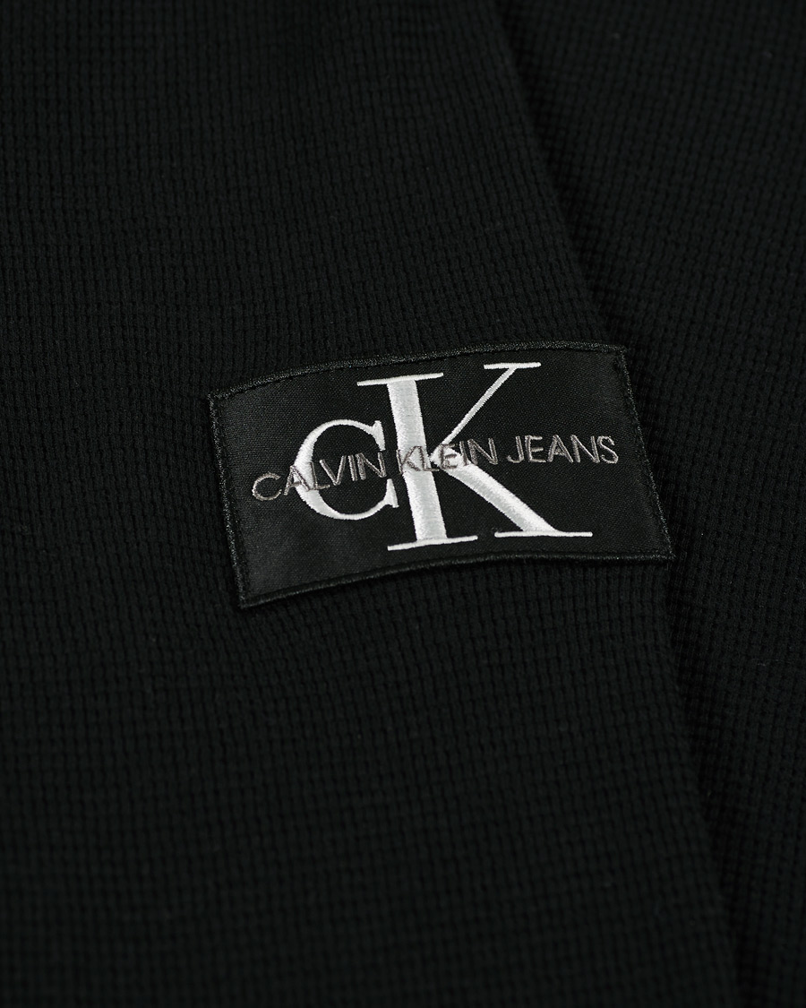 Herren | T-Shirts | Calvin Klein Jeans | Monogram Badge Waffle Long Sleeve Tee Black