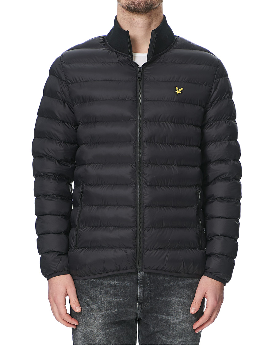 Black packable puffer jacket top