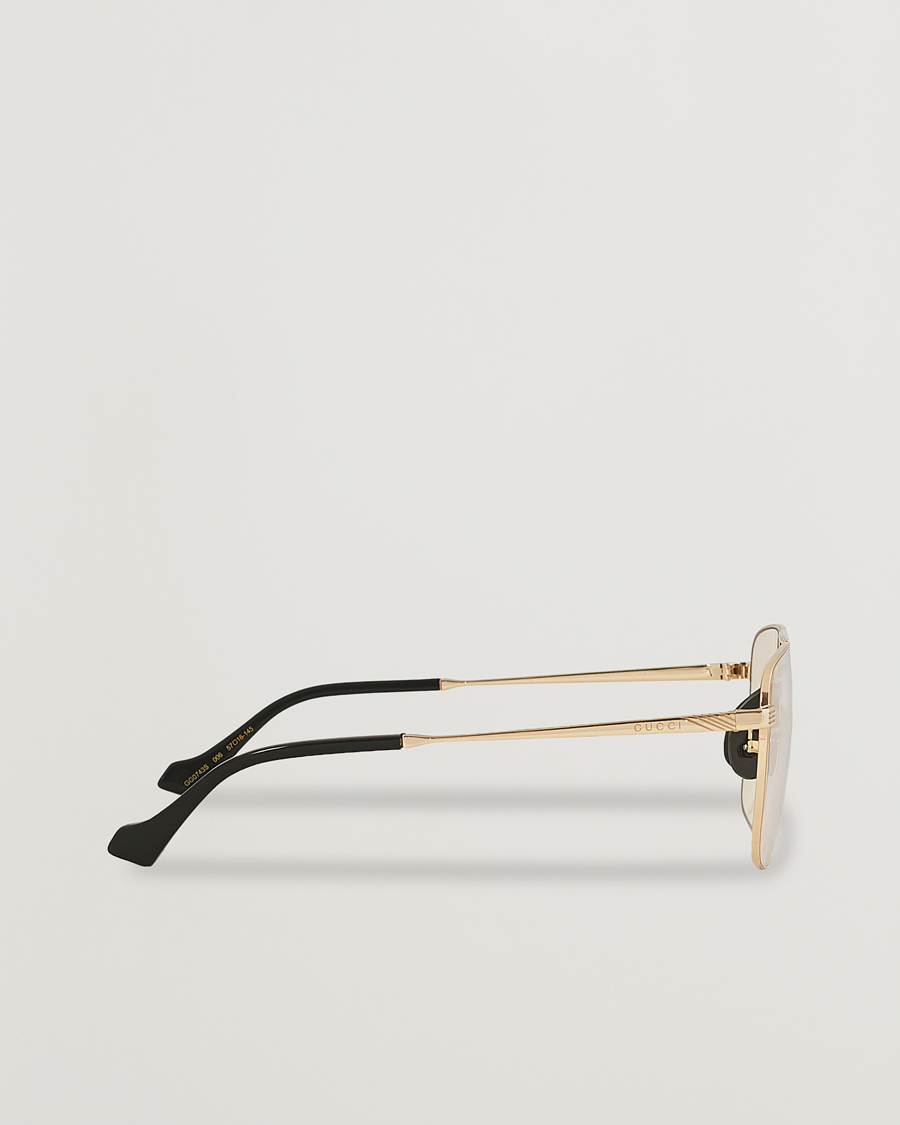 Herren | Gucci GG0743S Photochromic Sunglasses Shiny Endura Gold | Gucci | GG0743S Photochromic Sunglasses Shiny Endura Gold