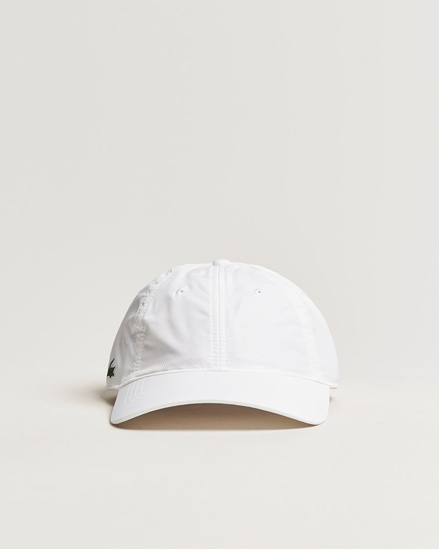 White Sports Cap Care of bei Lacoste Carl Sport