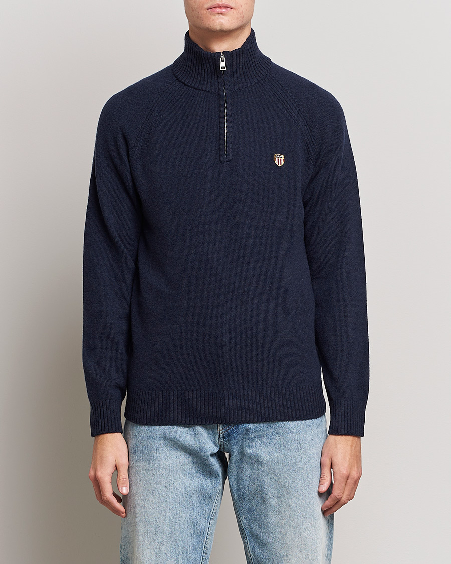Herren |  | GANT | Banner Shield Lambswool Half Zip Eavning Blue