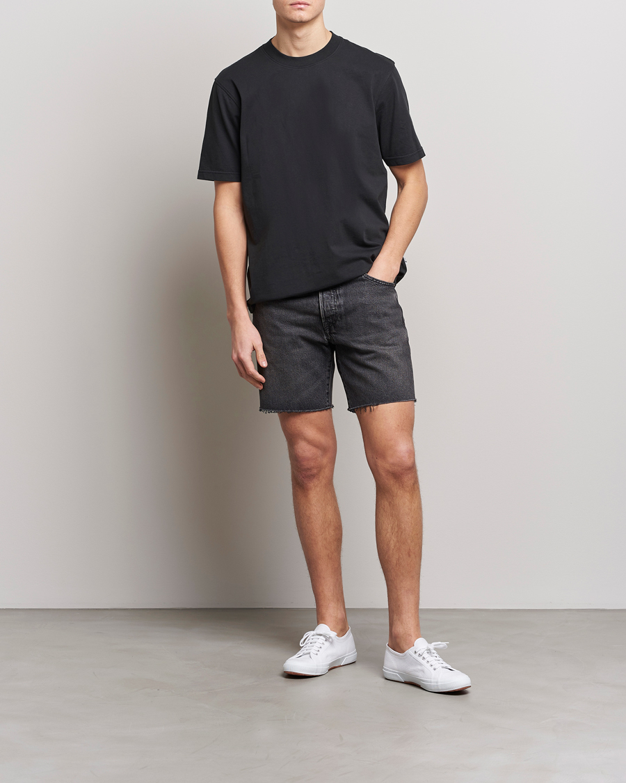 Black levi shorts mens shop