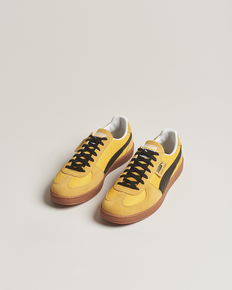 Black and yellow puma sneakers outlet