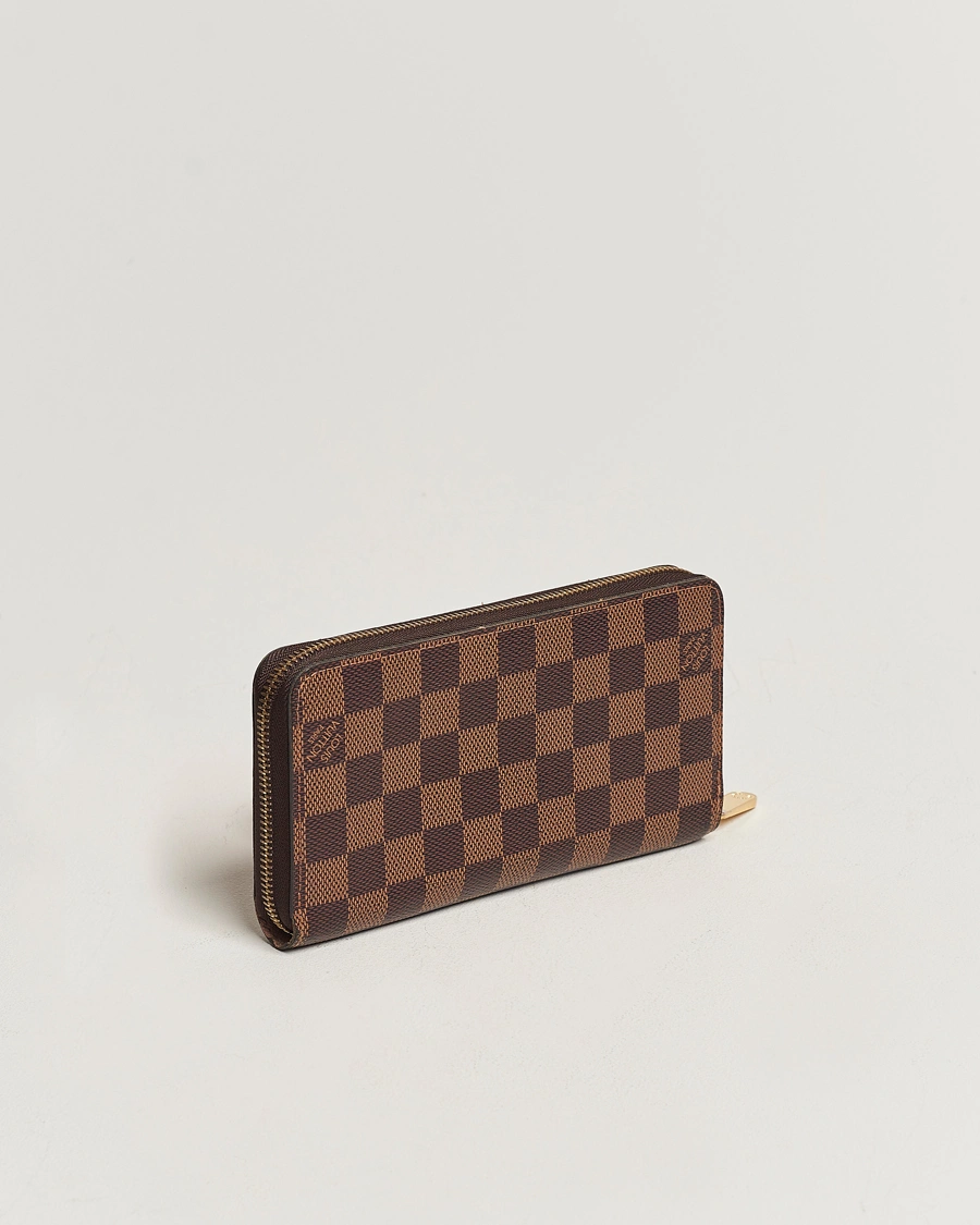 Herren | Louis Vuitton Pre-Owned | Louis Vuitton Pre-Owned | Zippy Wallet Damier Ebene 