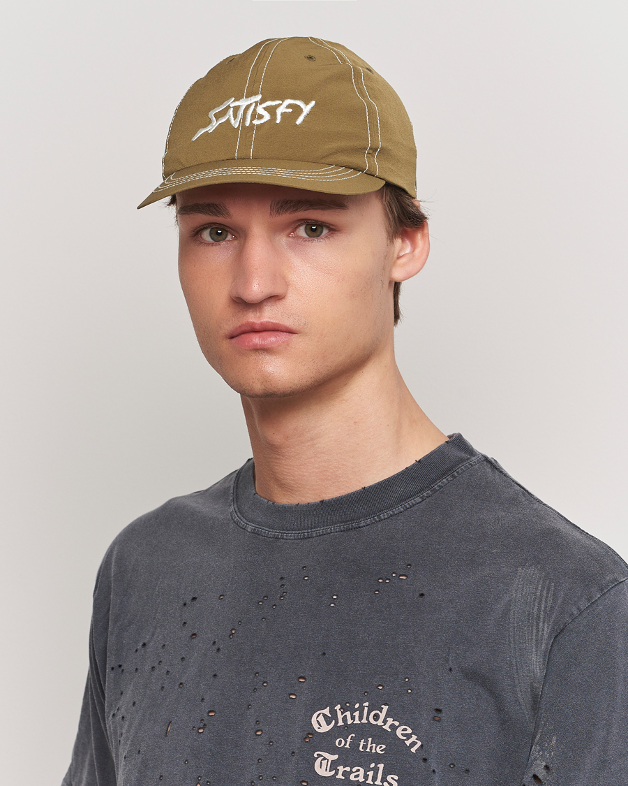 Herren | Satisfy PeaceShell Running Cap Oil Green | Satisfy | PeaceShell Running Cap Oil Green