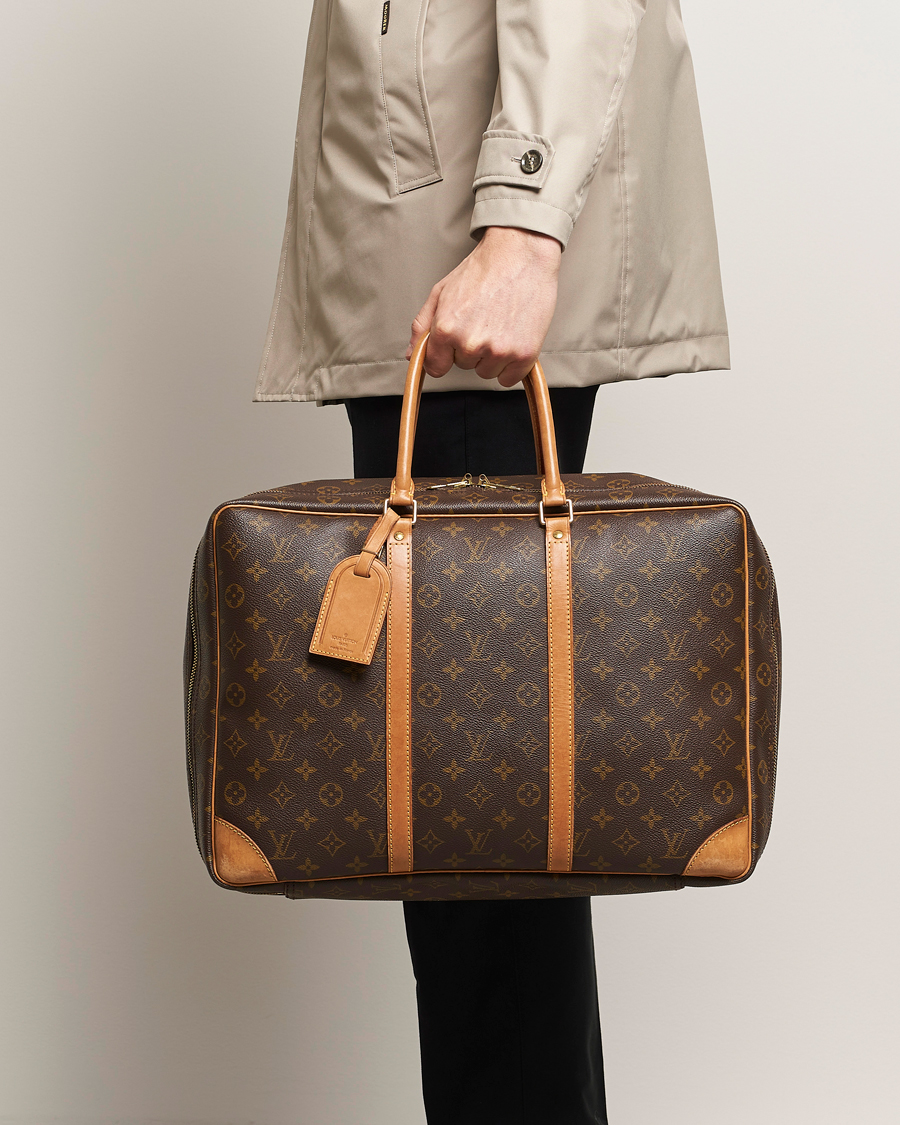 Herren | Louis Vuitton Pre-Owned | Louis Vuitton Pre-Owned | Stratos Cloth bag Monogram 