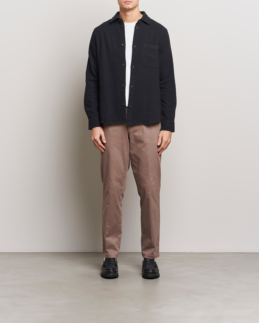 Black shirt brown chinos deals
