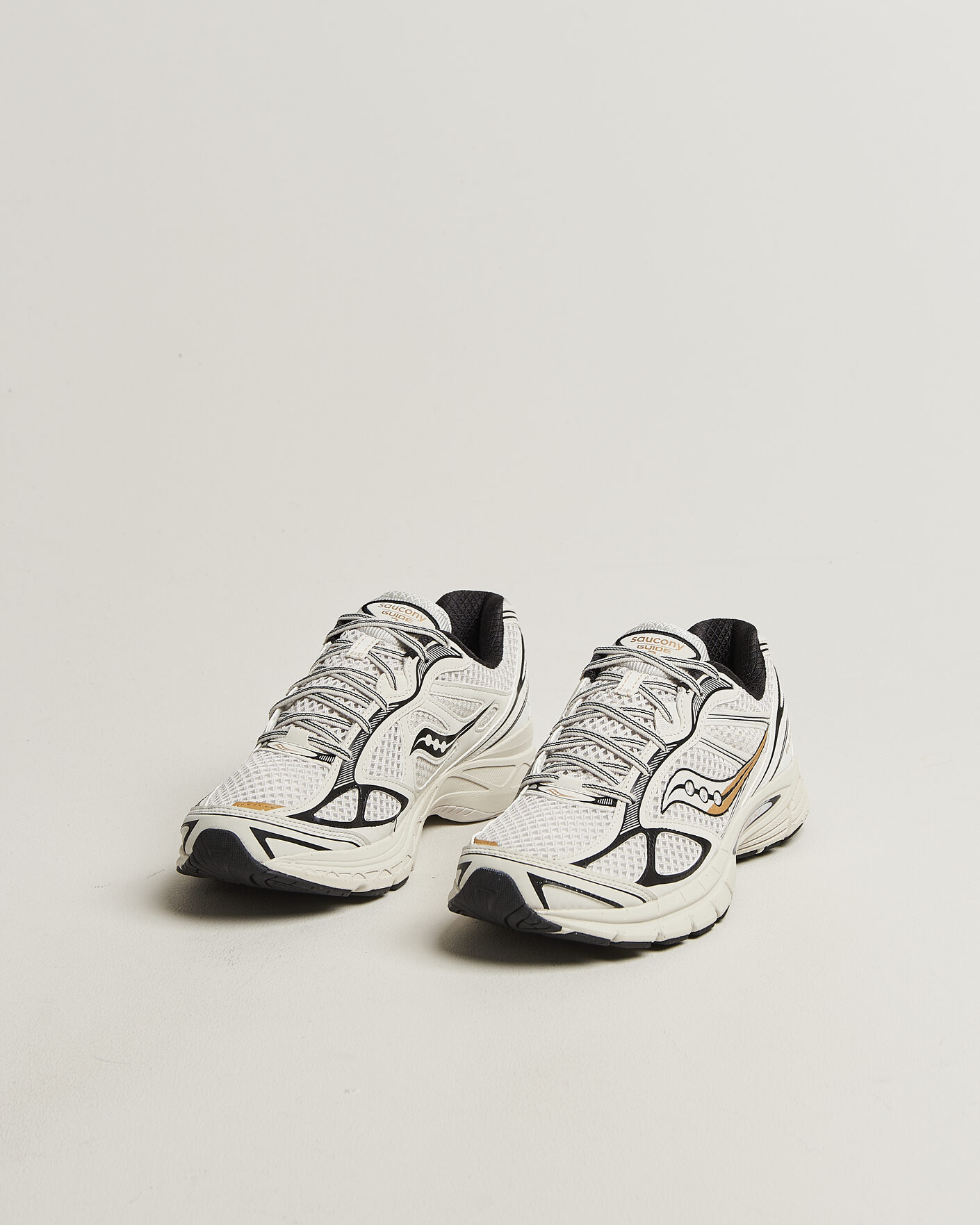 Herren | Sneaker | Saucony | Guide 7 Running Sneaker Onyx/Gold