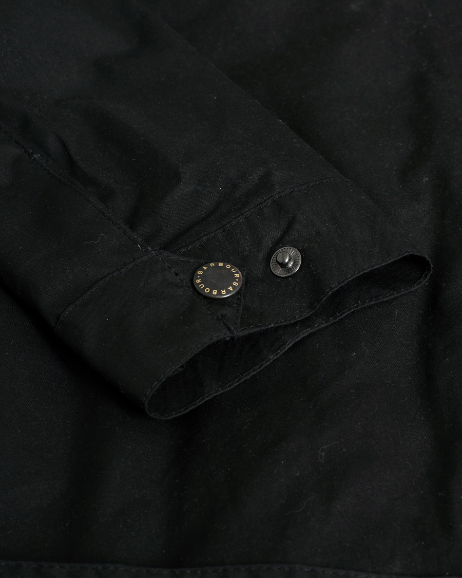 Herren | Barbour International Slim Wax Jacket Black | Pre-owned | Barbour International Slim Wax Jacket Black