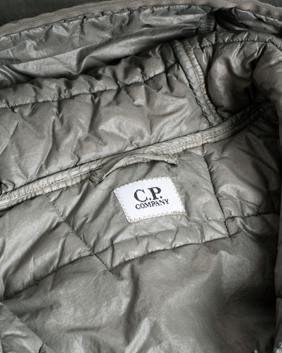 Herren | C.P. Company 50 Fili Garment Dyed Cotton/Nylon 2 in 1 Parka Green | Pre-owned | C.P. Company 50 Fili Garment Dyed Cotton/Nylon 2 in 1 Parka Green