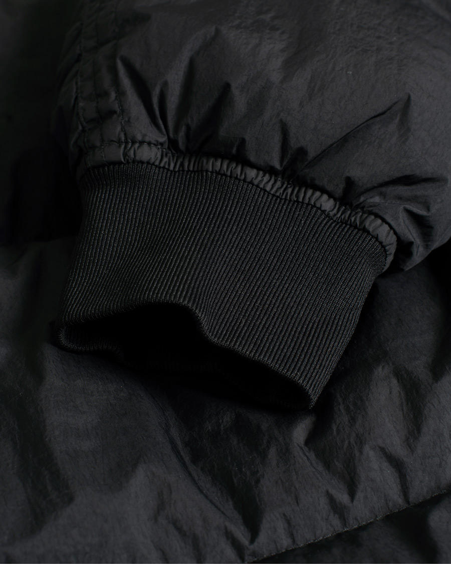 Herren | Stone Island Garment Dyed Recycled Nylon Down Jacket Black | Pre-owned | Stone Island Garment Dyed Recycled Nylon Down Jacket Black
